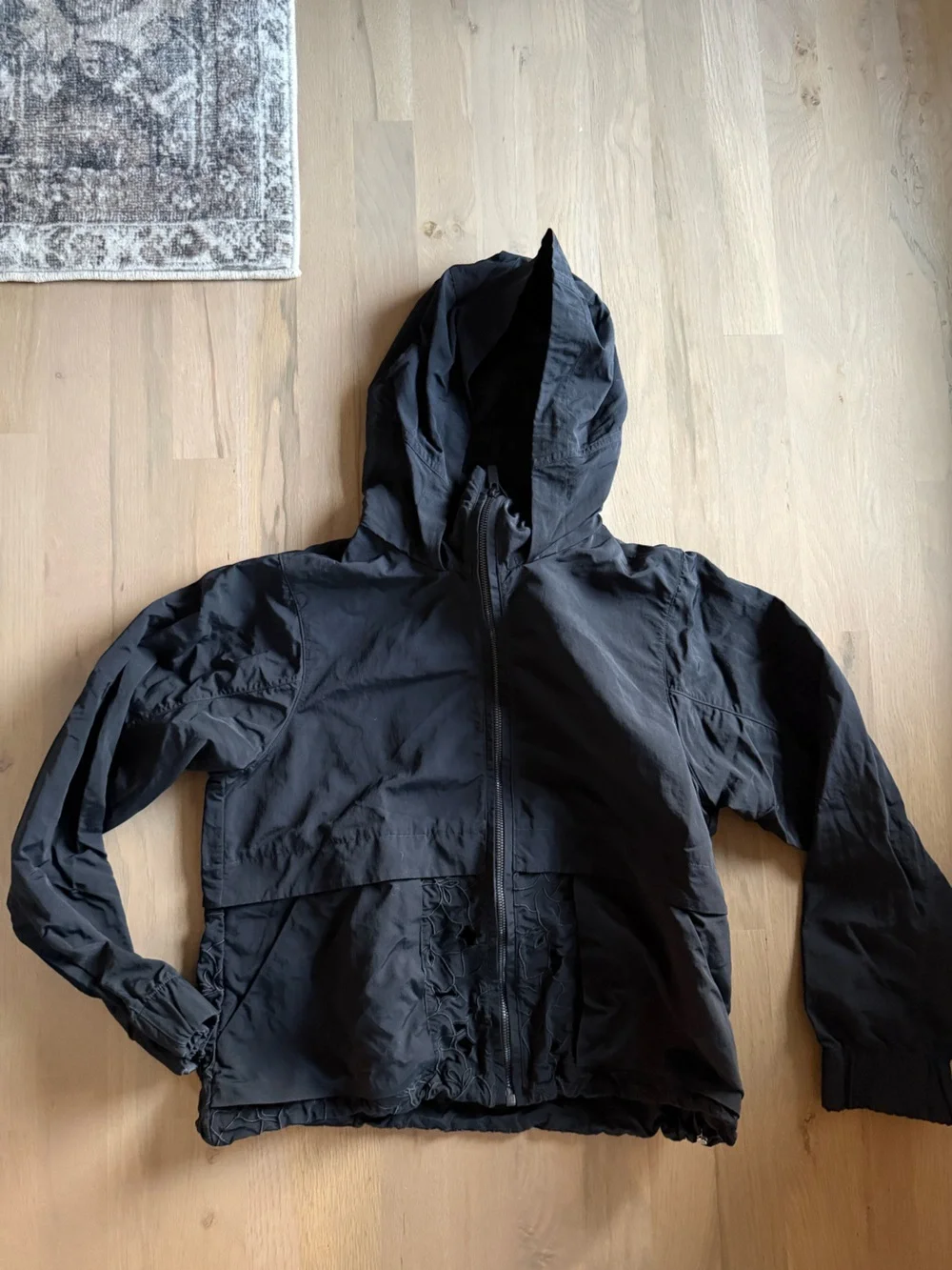 Lululemon Black Hooded Lightweight Jacket with lace floral detail